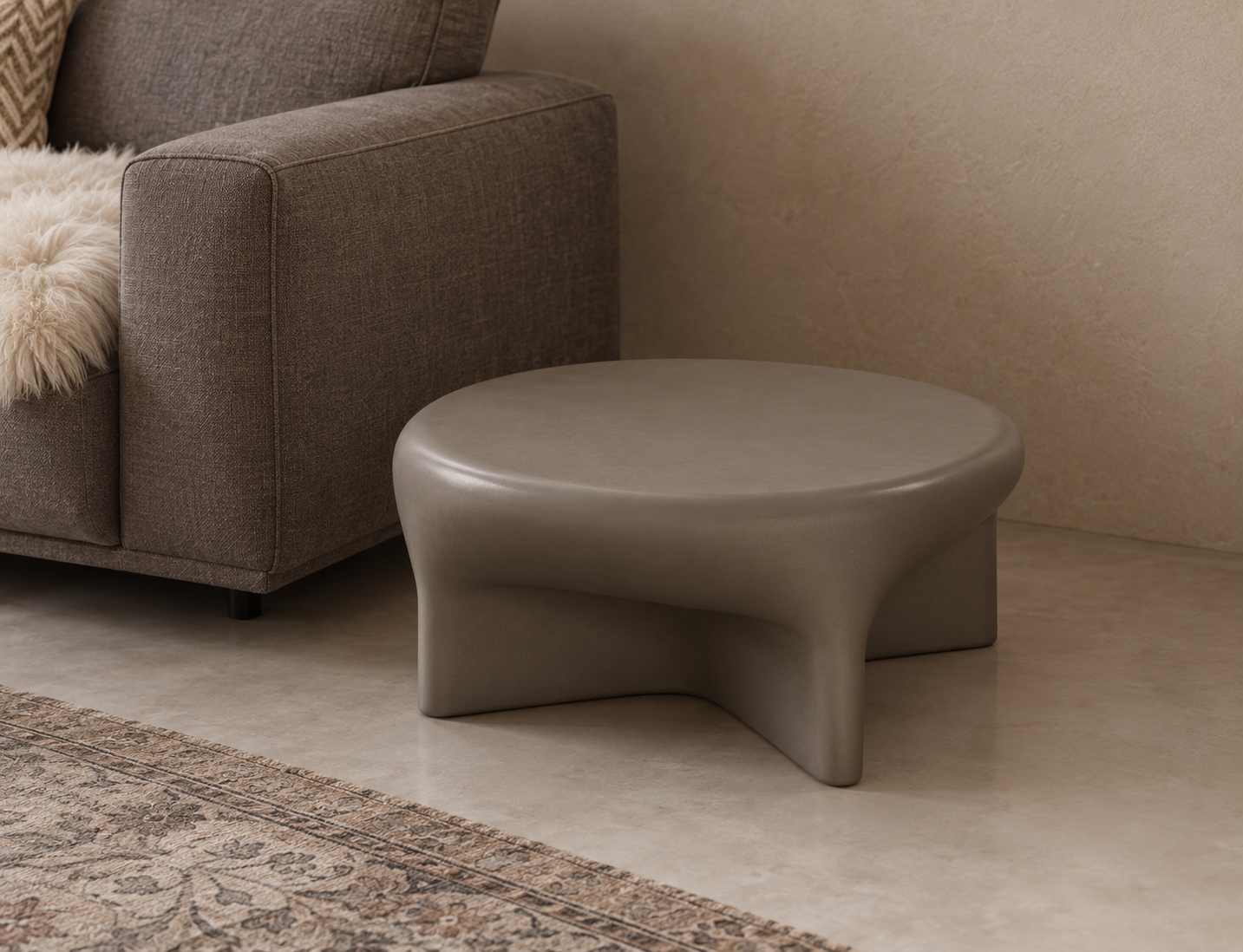 Sculptural Taupe Table in a Cozy Living Room